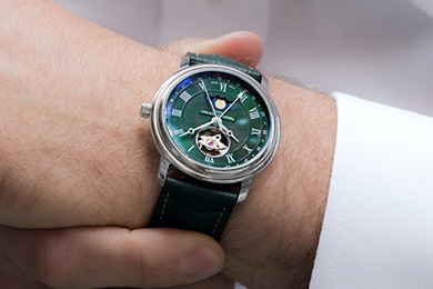 Female wrists wearing 4 Frederique Constant watches